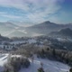 Aerial view of beautiful winter scenery in mountain ski resort. Mountains covered with snow - VideoHive Item for Sale