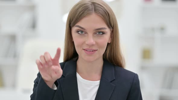 Portrait of Happy Businesswoman with Pointing with Finger and Inviting 