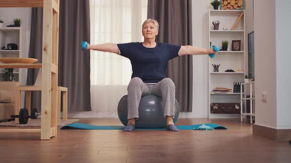 Old Woman Training Shoulders