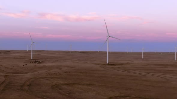 Aerial shots of a wind farm near Calhan in Colorado around sunset