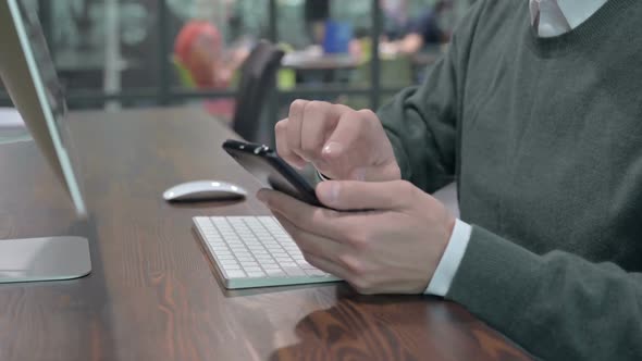 Close Up Shoot of Young Man Hands Using Cellphone