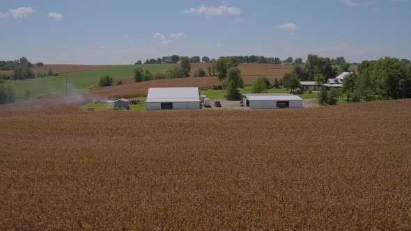 Drone pushes towards a farmhouse and woodworking shop in Illinois.