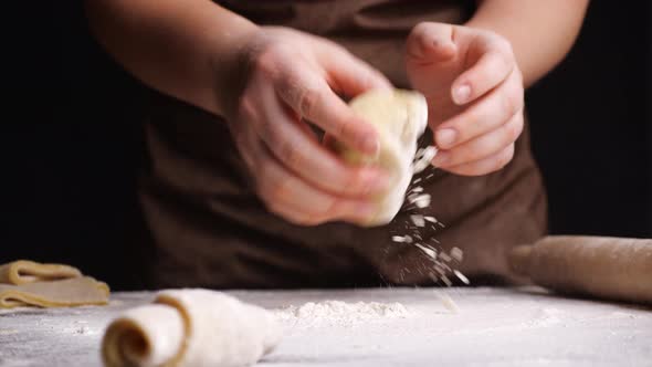 Crop Housewife Throwing and Kneading Dough