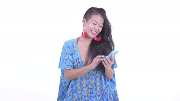 Happy Beautiful Asian Tourist Woman Using Phone