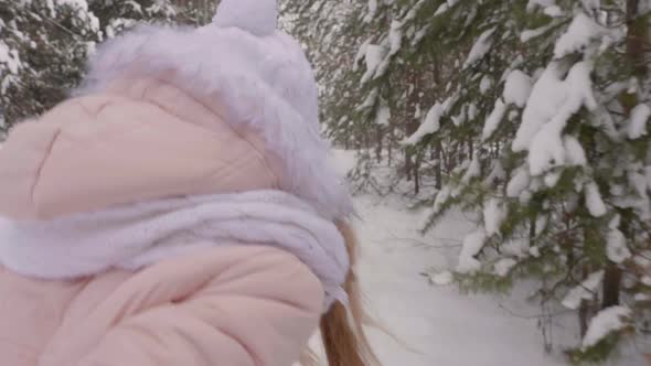 Happy Girl Hand Leading Through Snowy Path Way