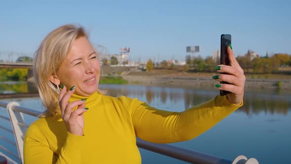 Middleaged Woman Making an Online Video Call