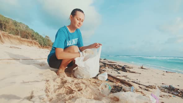 Young Woman Volunteer Collects Fights Nondegradable Waste That Harms Beach