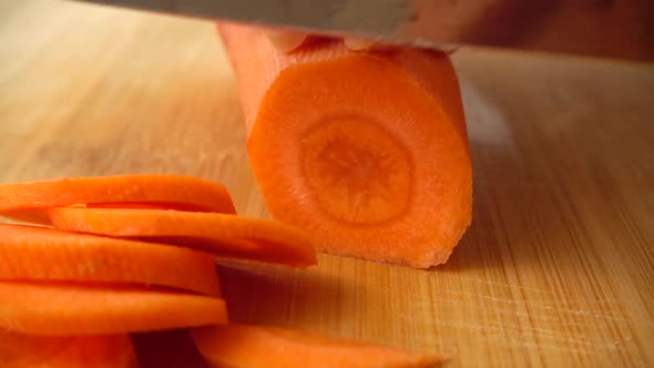 The cook cuts carrots 5