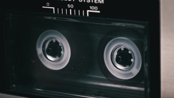 Audiocassette Rotates in Vintage Tape Recorder