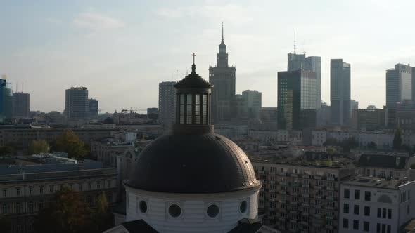 Fly Around Dome of Holy Trinity Church with Golden Cross on Top