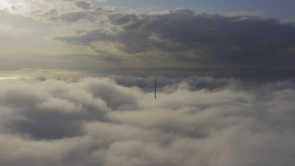 Aerial View of the Upper Part of the Broadcasting Tower in the Fog