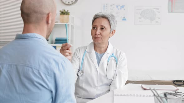 Doctor Checking Vision of Patient