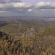 Aerial View of Autumn Forest and Granite Rocks in the Siberian Nature Reserve Stolby. - VideoHive Item for Sale