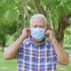 Portrait of Elderly old Asian man taking off face mask - VideoHive Item for Sale