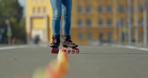 Closeup Roller Skating Feet Circling Criss Cross Cones