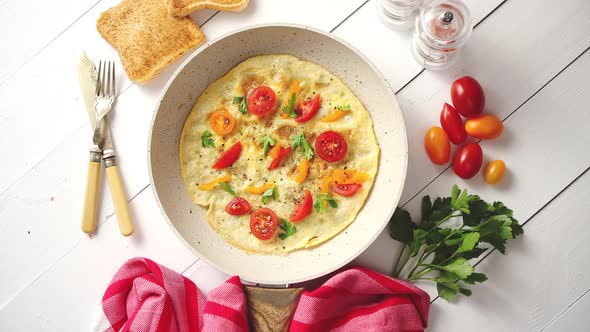 Tasty Homemade Classic Omelet with Cherry Tomatoes