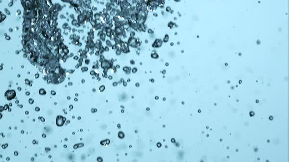 Water pouring and splashing in ultra slow motion 1500fps on a reflective surface - WATER POURS 100