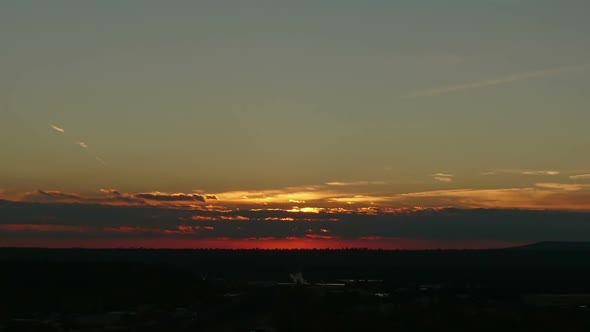 Red Sunrise Over Small Town