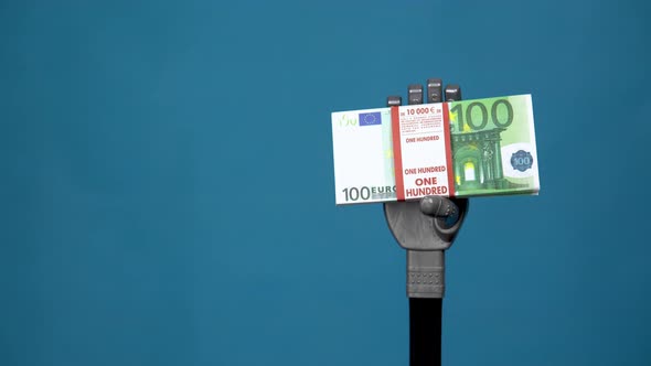 A Mechanical Hand Holds a Bundle of Euros. A Gray Cyborg Hand Holds Money on a Blue Background.