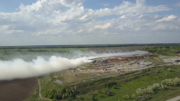 Burning Garbage Dump Pollutes the Environment