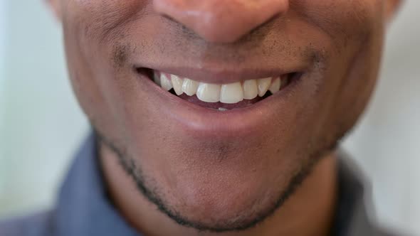 Close Up of Mouth of Smiling Young African Man 