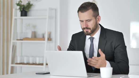 Shocked Businessman Working on Laptop, Astonished