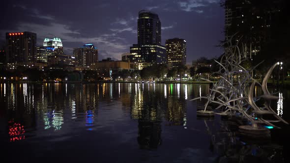 Buildings and the Birds sculpture at night