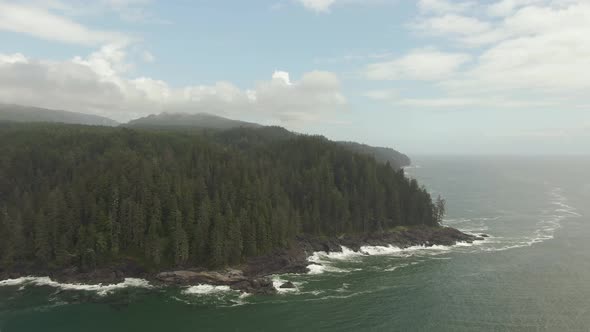 Beautiful Aerial Landscape View of the Rocky Pacific Ocean Coast in the Southern Vancouver Island du