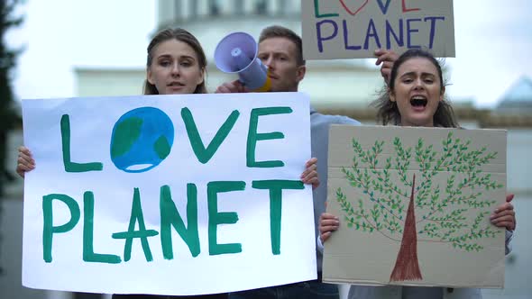 Young People Chanting Slogans About Planet Ecology, Deforestation Problems