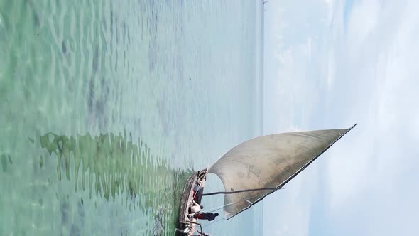 Tanzania Vertical Video  Boat Boats in the Ocean Near the Coast of Zanzibar Aerial View