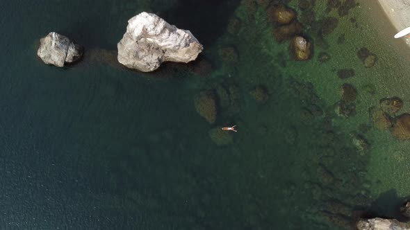 Woman Floating Sea