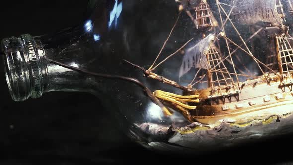The art of Ship in a Bottle, Tiny, Miniature Ship in a Bottle.