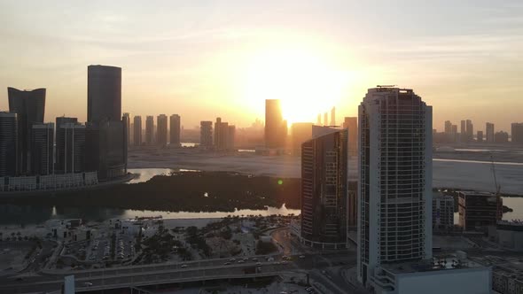 Sunset in Abu Dhabi Aerial View on Al Reem Island Surrounded By Modern Skyscrapers Between the