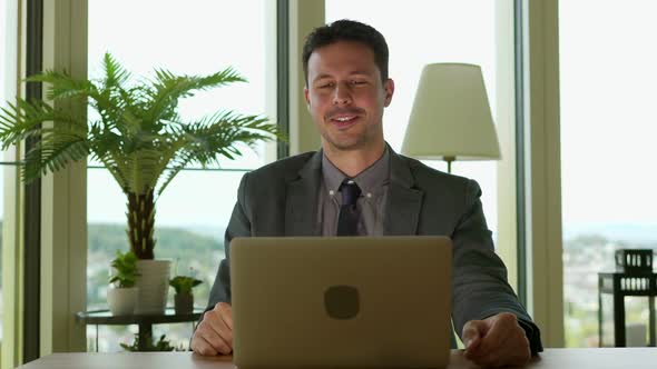 Business Person Working on Computer Desk in Modern Office