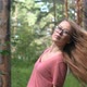 Girl with long, blonde, swaying hair turning around outdoor in summer park. - VideoHive Item for Sale