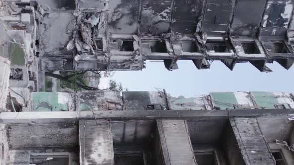 Vertical Video of the Consequences of the War in Ukraine  a Destroyed Building