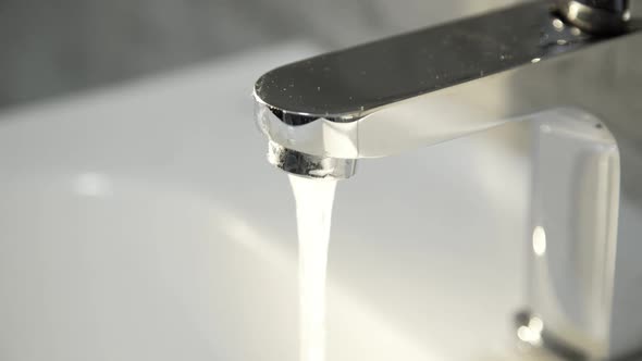 Close View of Hands Washing Them Under Steam of Water in Faucer