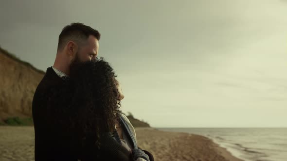 Romantic Couple Hugging Together on Sea Beach