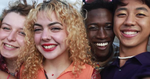 Young diverse people having fun outdoor laughing together