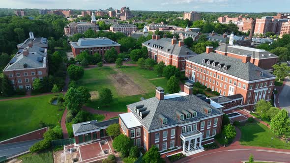 Campus of Johns Hopkins University in summer golden hour light. Prestigious selective higher educati