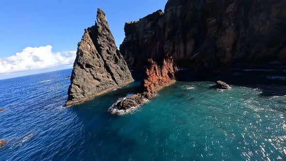 FPV Racing Drone Mountain Surfing and Cliff Diving Along the Rocks