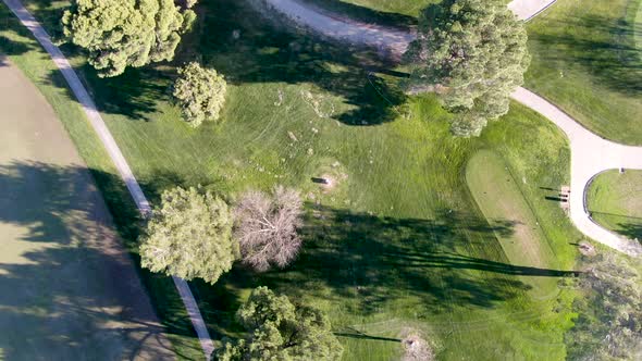 Aerial View of Golf Course with Green Field in the Valley.