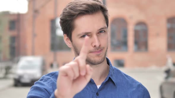 No Young Man Rejecting Offer By Waving Finger