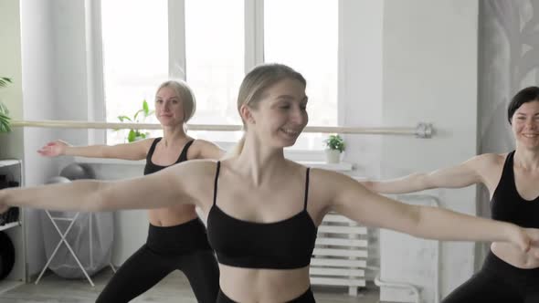 Three Sporty Females Training Indoors