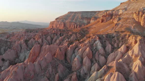 Cappadocia Aerial Drone View to Sunset Red and Rose Valley Rocks Goreme Turkey