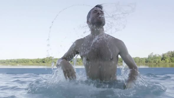 Man emerging from water