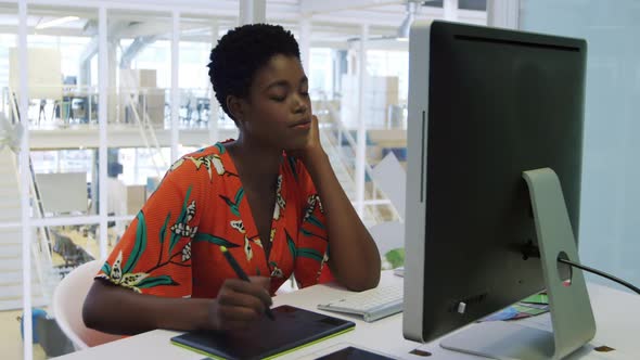 Young woman working in a creative office