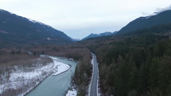 Aerial View of Chilliwack River with Snow During Winter Season