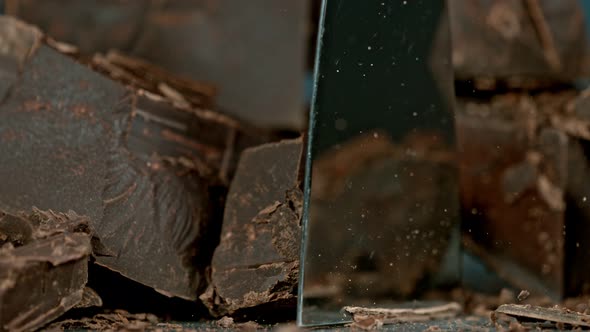 Super Slow Motion Shot of Cutting Raw Chocolate Chunk at 1000 Fps.