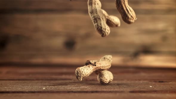 Inshell Peanuts Fall on the Table